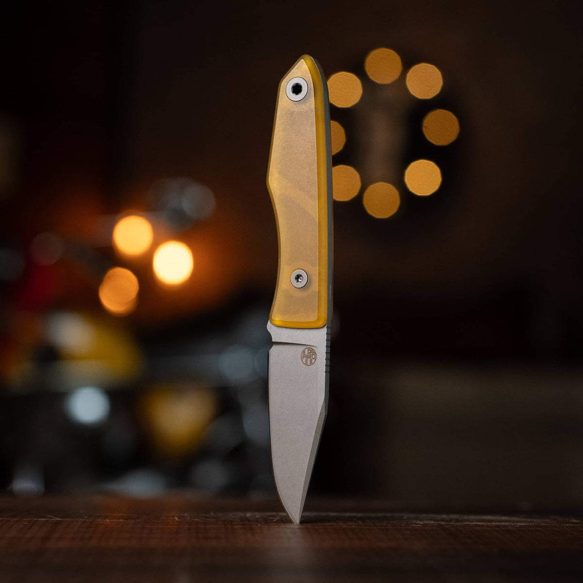 USA Lookout knife with translucent yellow Ultem handle displayed upright
