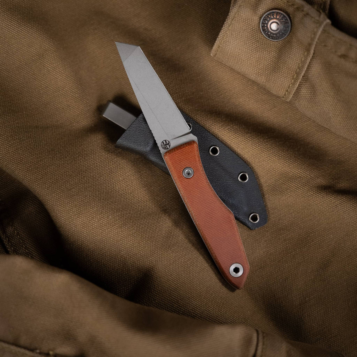 Lookout tanto knife with Natural Micarta handle and Kydex sheath on brown canvas

