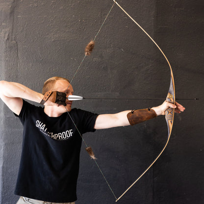 The BONES longbow with a reflex-deflex design.