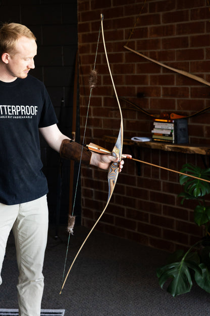 The BONES reflex-deflex longbow, shown in a product photo.